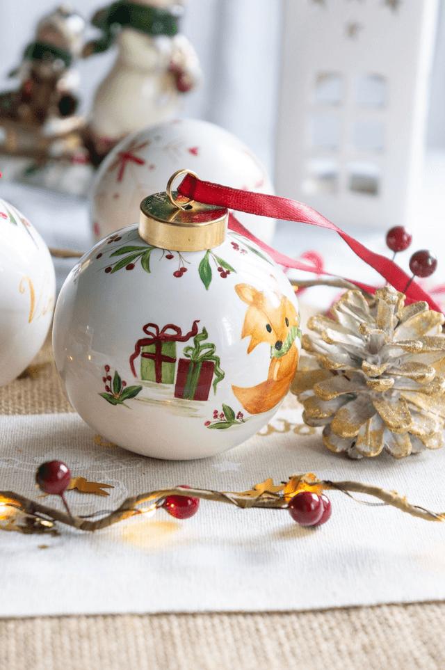 Boule mon premier Noël personnalisable en porcelaine, motif faon, renard à accrocher dans le sapin .